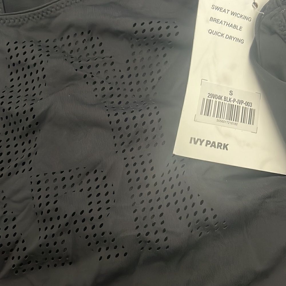 Laser Logo Racerback Tank
IVY PARK® NEW - Picture 3 of 3